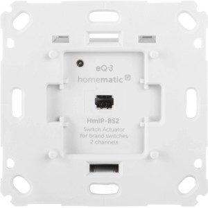 Weißer Homematic IP Schaltaktor 2-fach für Markenschalter, Rückseite mit Montageöffnungen und Anschluss.