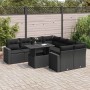 Schwarze 9-teilige Garten-Sofagarnitur aus Poly Rattan mit Tisch und Kissen.