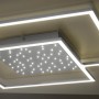Quadratische LED-Deckenleuchte Yuki in Stahlfarben mit Sternenhimmel-Effekt.
