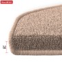 Detailaufnahme: Halbrunde, beige KARAT Stufenmatte London Pro (25x65 cm) mit geketteltem Rand.