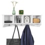 Weiße SoBuy Wandgarderobe mit 5 Haken, Fächern und Deko-Elementen. Jacke und Tasche hängen an der Garderobenleiste.