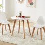 Weiße Essgruppe Louloune: runder Kindertisch mit Holzbeinen und 2 Stühlen im skandinavischen Design.