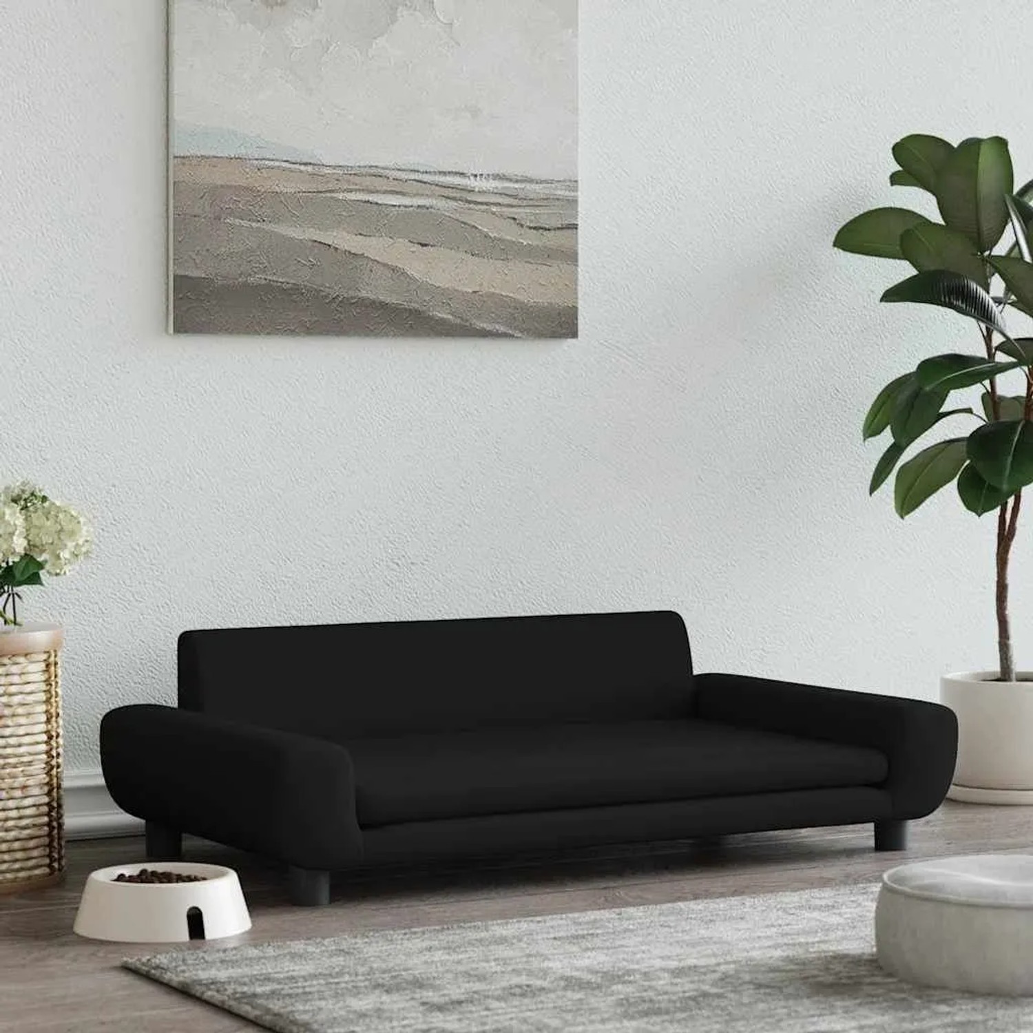 Schwarzes vidaXL Hundebett (100x54x33 cm) aus Samt im Wohnzimmer.