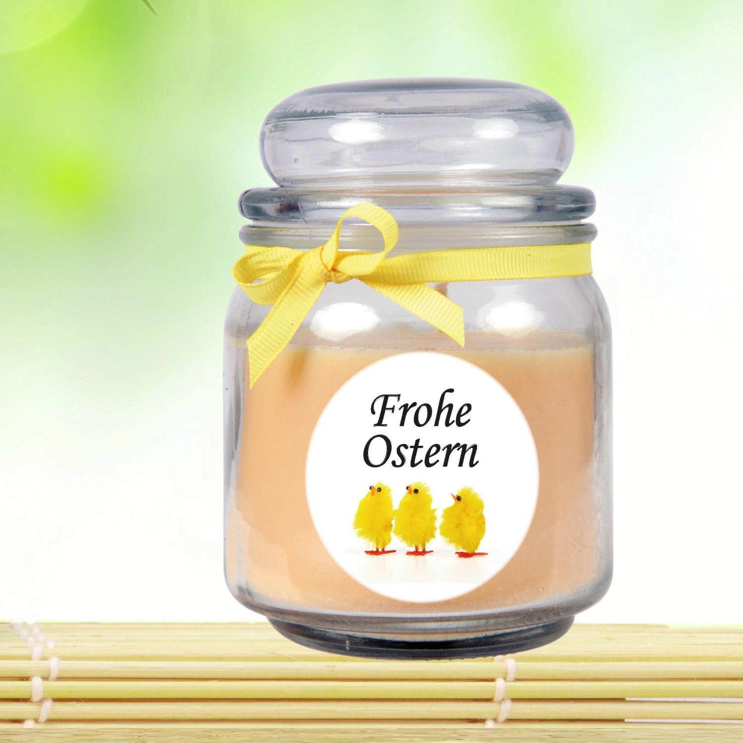 Duftkerze Frohe Ostern im Glas (Ø9cm) mit Vanilleduft und Küken-Motiv.