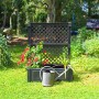Anthrazitfarbener KHW Pflanzkasten mit Spalier, 140x100x43 cm, bepflanzt mit Blumen und einer Gießkanne davor.