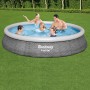 Bestway Fast Set Pool-Set, Ø 396 cm, mit Familie im Wasser. Quick-Up Pool in Schiefergrau.