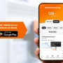 Hand hält Smartphone mit der heyOBI App zur Stromverbrauchsmessung des OBI ENERGY TRACKER.