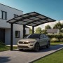 Schwarzer Ximax Alu Carport Portoforte XL mit Auto. Einzelcarport mit transparentem Dach.