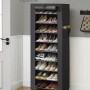 Schwarzes Songmics Schuhregal mit 10 Ebenen und diversen Schuhen.