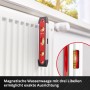 Einhell Wasserwaage mit Magnet und drei Libellen am Heizkörper, Teil des Werkzeugkoffer Sets.
