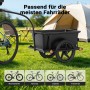 Schwarzer Wiltec Lastenanhänger mit Wanne, an Fahrrad gekoppelt, im Grünen vor Zelt. Passt für viele Fahrradtypen.