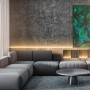 Wohnzimmer mit indirekter Beleuchtung durch Brilo LED-Strip COB Warmweiß unterhalb der Wandverkleidung.