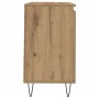 Waschbeckenunterschrank Artisan-Eiche aus Holzwerkstoff, Seitenansicht. Heller Holzton mit Maserung, schwarze Metallbeine für Bad.