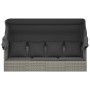 Graues Outdoor-Loungebett mit Dach und Kissen aus Polyrattan für Garten oder Terrasse.