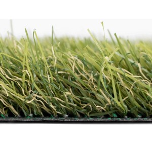 Detailaufnahme Kunstrasen Arizona Grün: Naturgetreue Rasenstruktur mit grünen und beigen Halmen.