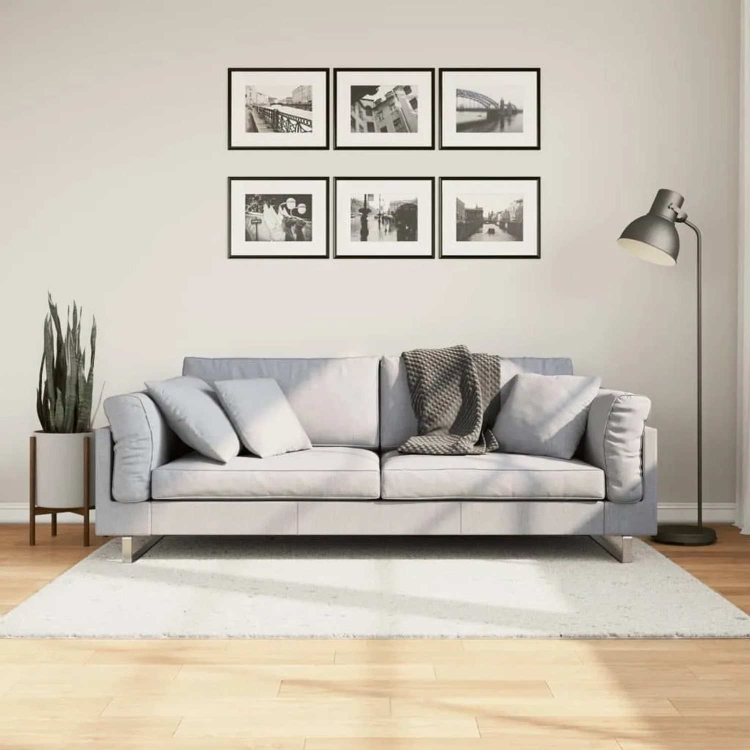 Cremefarbener, runder vidaXL Teppich OVIEDO Kurzflor, 120x120 cm, im Wohnzimmer.