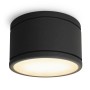 Schwarzer, dimmbarer LED Aufbauspot CELI-WX von SSC-LUXon mit warmweißem Licht. Flaches, rundes Design.