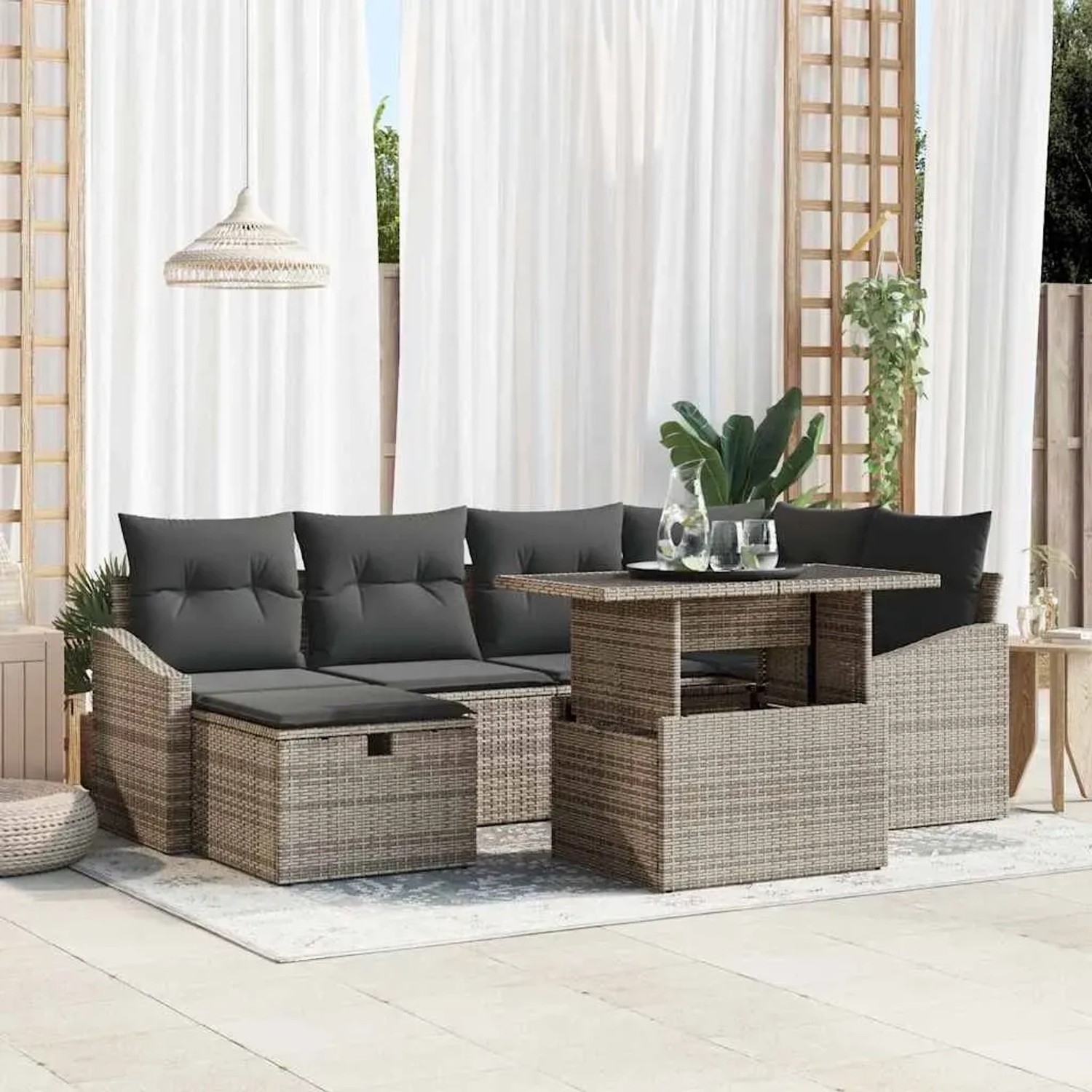 Graues 7-teiliges vidaXL Garten-Sofa-Set aus Polyrattan mit Kissen und Stauraum.
