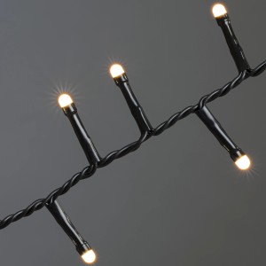 Konstsmide Micro LED Lichterkette mit bernsteinfarbenen Dioden für Außen, schwarzes Kabel.