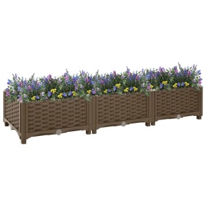 Braunes furnicato Hochbeet (120x40x23 cm) aus Polypropylen, bepflanzt mit Blumen.
