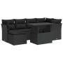 Schwarze 7-teilige Garten-Sofagarnitur aus Polyrattan mit Tisch und Kissen.