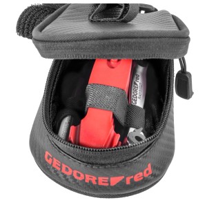 Gedore red Bike-Set Unterwegs in geöffneter Tasche mit Werkzeug, Reifenheber, Bits und Steckschlüssel.