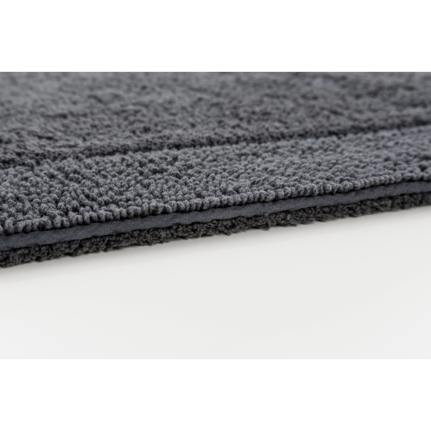 Detailaufnahme: Schöner Wohnen Badteppich Bahamas in Anthrazit mit Bordüre, 67x110 cm.