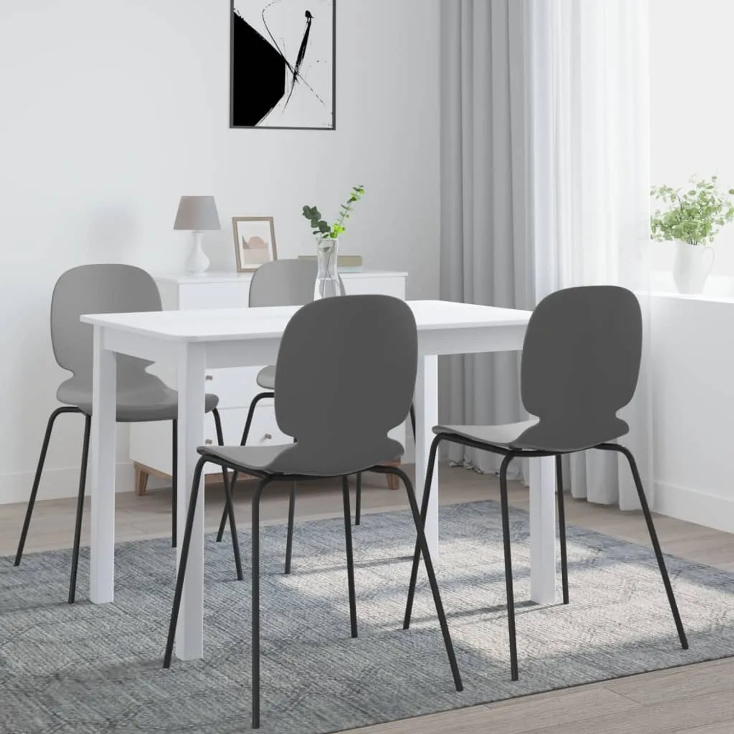 Weißer vidaXL Esstisch aus Gummiholz, 114x71 cm, mit vier Stühlen im Esszimmer.