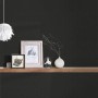 Schwarze Bricoflor Vliestapete mit Struktur-Effekt im Schlaf-/Wohnzimmer.