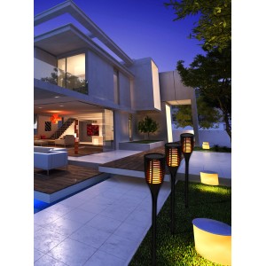 Schwarze Näve LED-Solarfackel (78 cm) mit Erdspieß im Garten, erzeugt warmen Flammeneffekt.