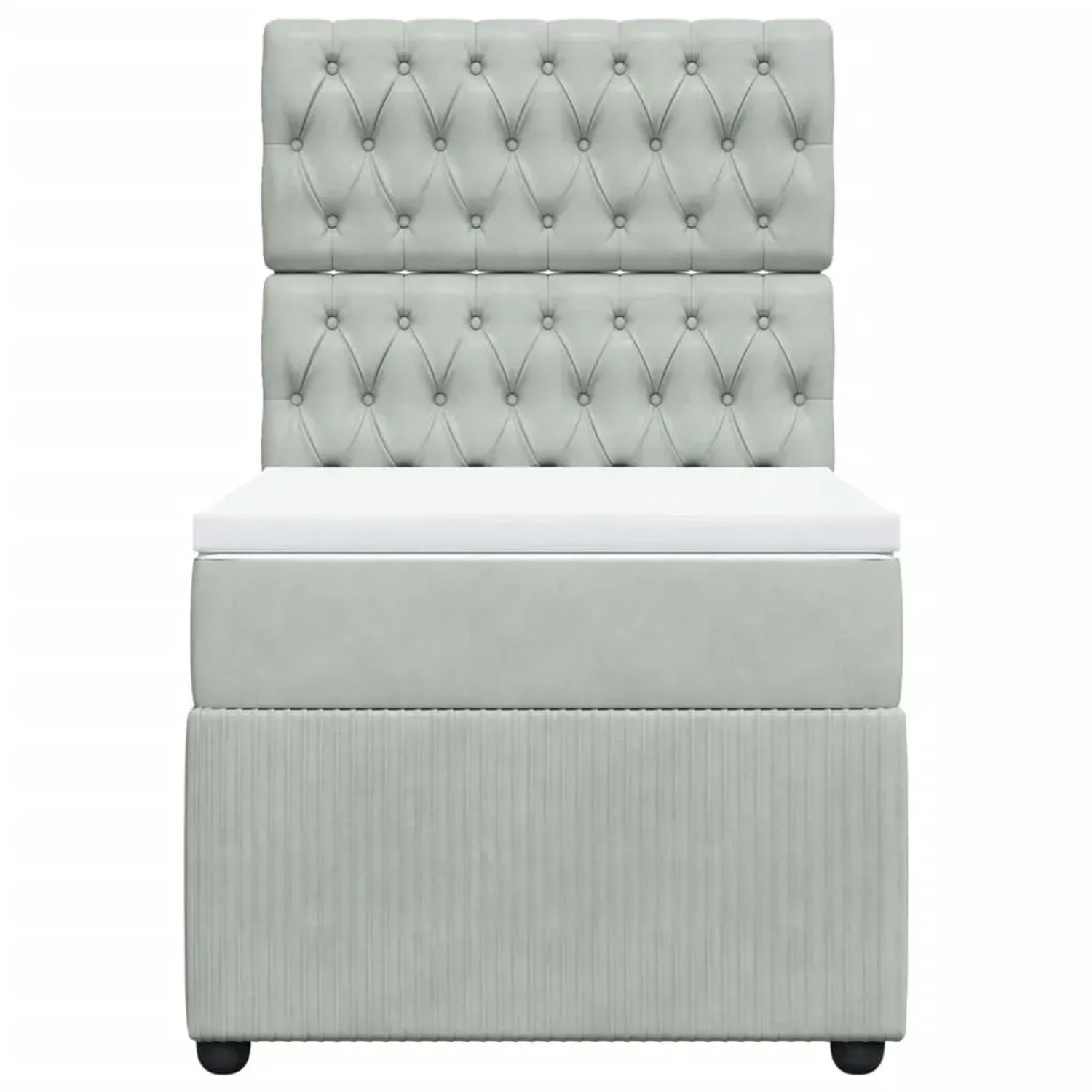 Helles Boxspringbett 90x190 cm mit Samtbezug, Matratze und Kopfteil.