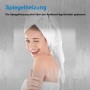 Frau vor beschlagener Aica Sanitär Badspiegel mit Spiegelheizung und Handtuch auf dem Kopf.