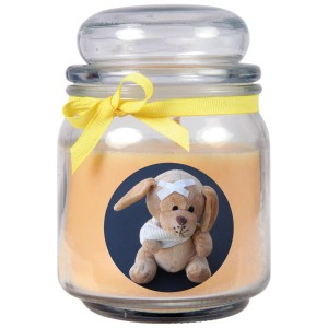 Gelbe Duftkerze im Glas mit Hunde-Motiv und Vanille-Duft. Ideal zur Genesung.