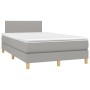 Helles, graues vidaXL Boxspringbett 120x200 cm mit Matratze und Kopfteil.