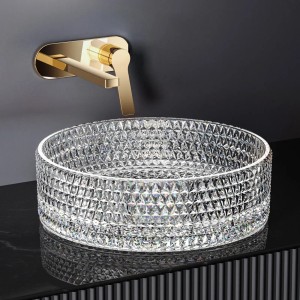 Rundes Emke Aufsatzwaschbecken aus Klarglas mit goldener Armatur. Modernes Design für Bad oder Gästetoilette.