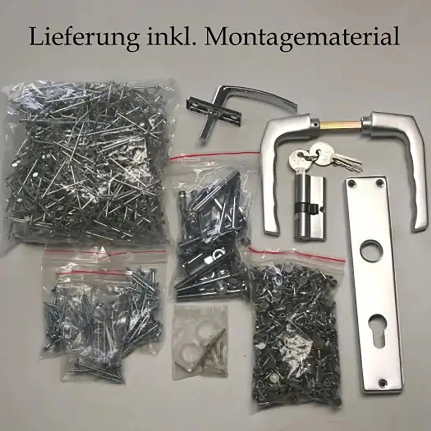 Montagematerial für Alpholz Gartenhaus Bremen-28: Beschläge, Schrauben, Nägel, Schloss mit Schlüssel.