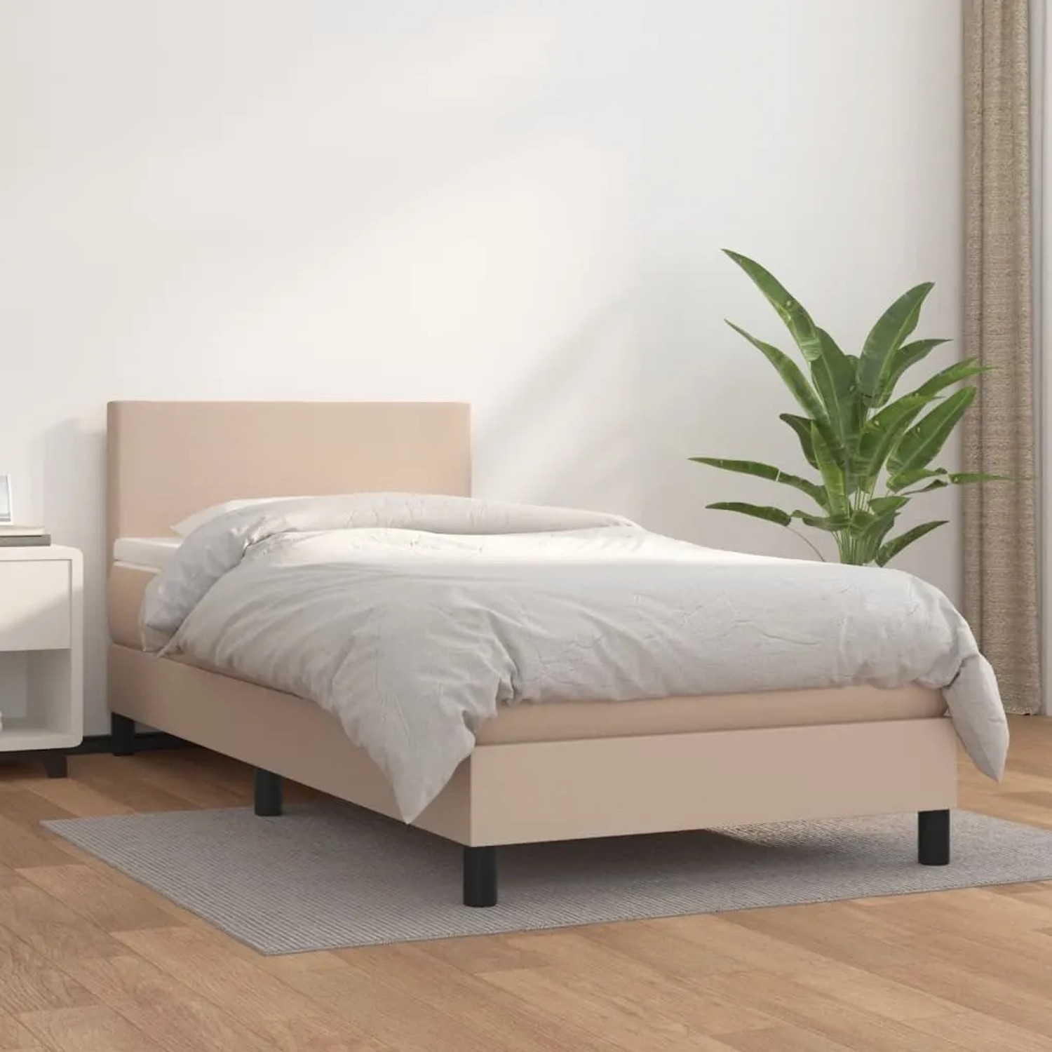Boxspringbett in Cappuccino-Braun (100x200cm) mit Kunstlederbezug und Matratze.