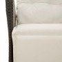 Detailansicht: Schwarzer Poly Rattan Gartensessel mit cremefarbenen Kissen der vidaXL Essgruppe.