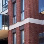 Elabrick Eckverblender Geneve an Fassade, rotbraune Backsteinoptik für Außenbereich.