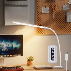 Weiße LED Klemmlampe mit flexiblem Schwanenhals und linearer Leiste auf Schreibtisch. Dimmbar, einstellbare Farbtemperatur, USB.