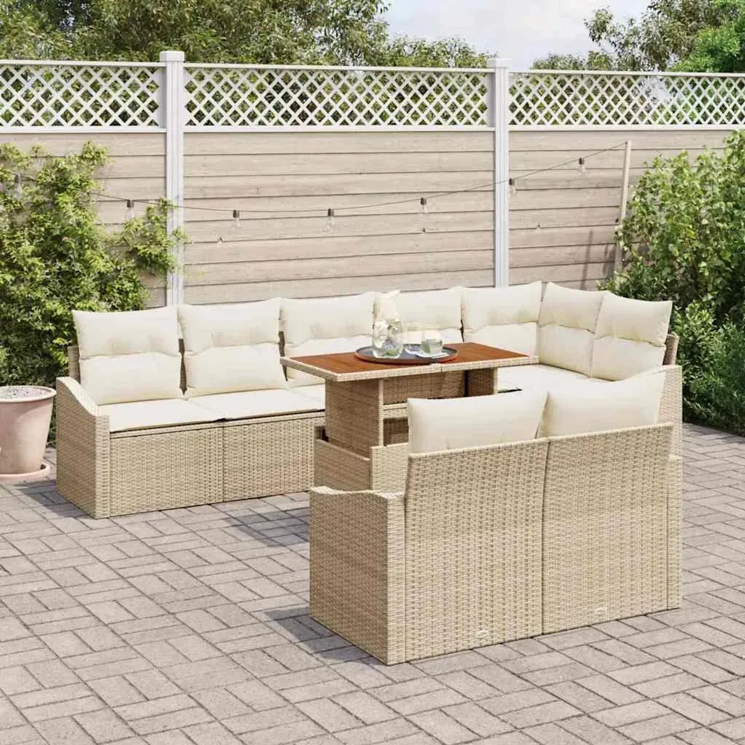 Beiges 9-teiliges vidaXL Garten-Sofa-Set aus Poly Rattan mit Tisch und Stauraum.