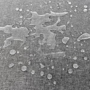 Wasserabweisendes, hellgraues Beautissu Loungekissen (Detailaufnahme).