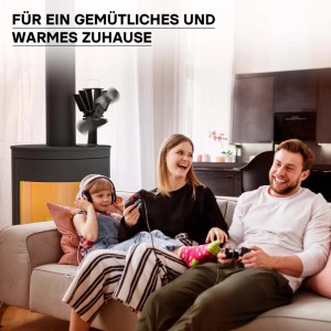 Wiltec Kaminofen Ventilator mit 2 Blättern auf Ofen, verteilt Wärme im gemütlichen Wohnzimmer. Familie lacht.