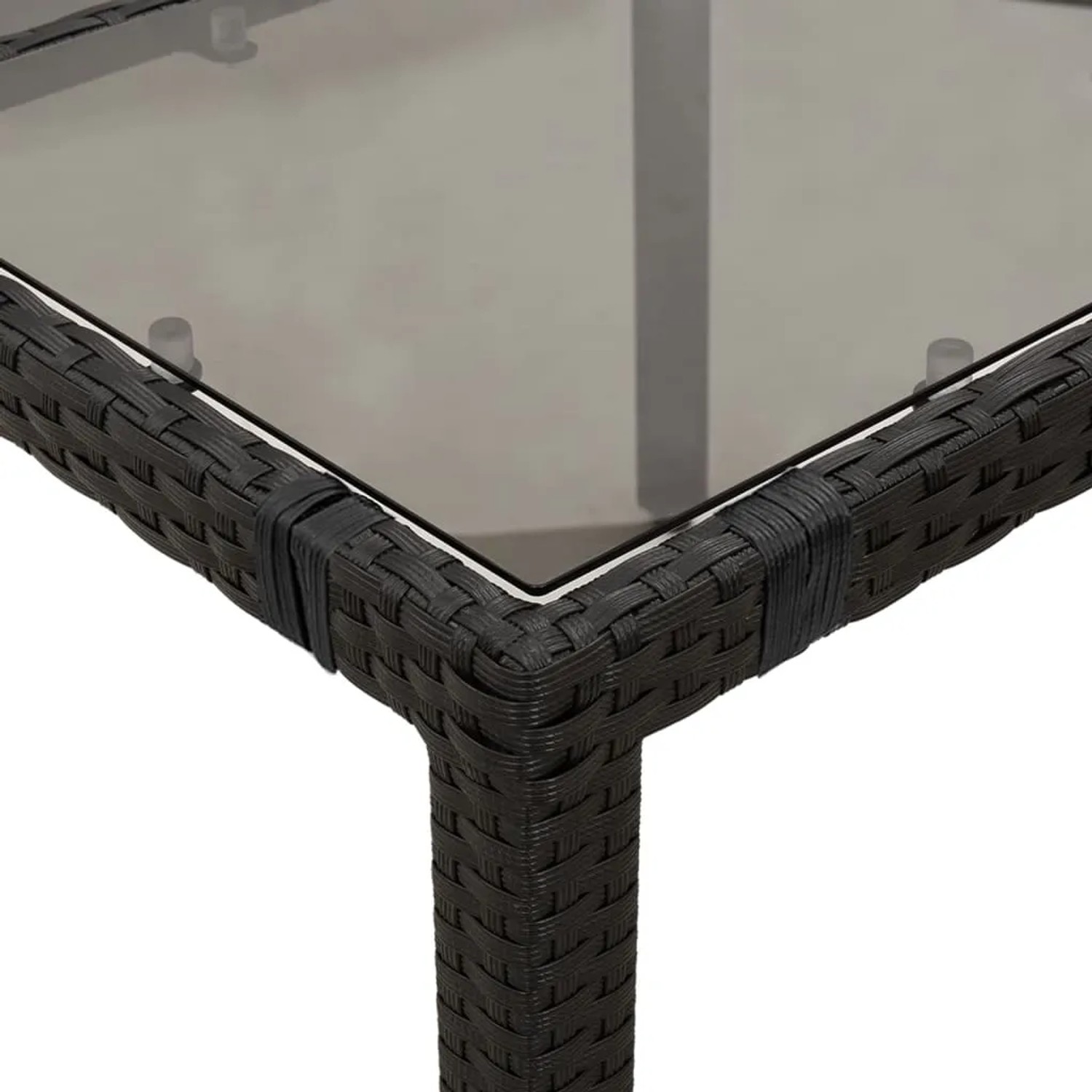 Detailansicht Gartentisch der vidaXL 5-tlg. Essgruppe aus schwarzem Poly Rattan mit Glasplatte.