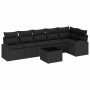Schwarzes 7-teiliges Garten-Sofa-Set aus Poly Rattan mit Kissen und Tisch.