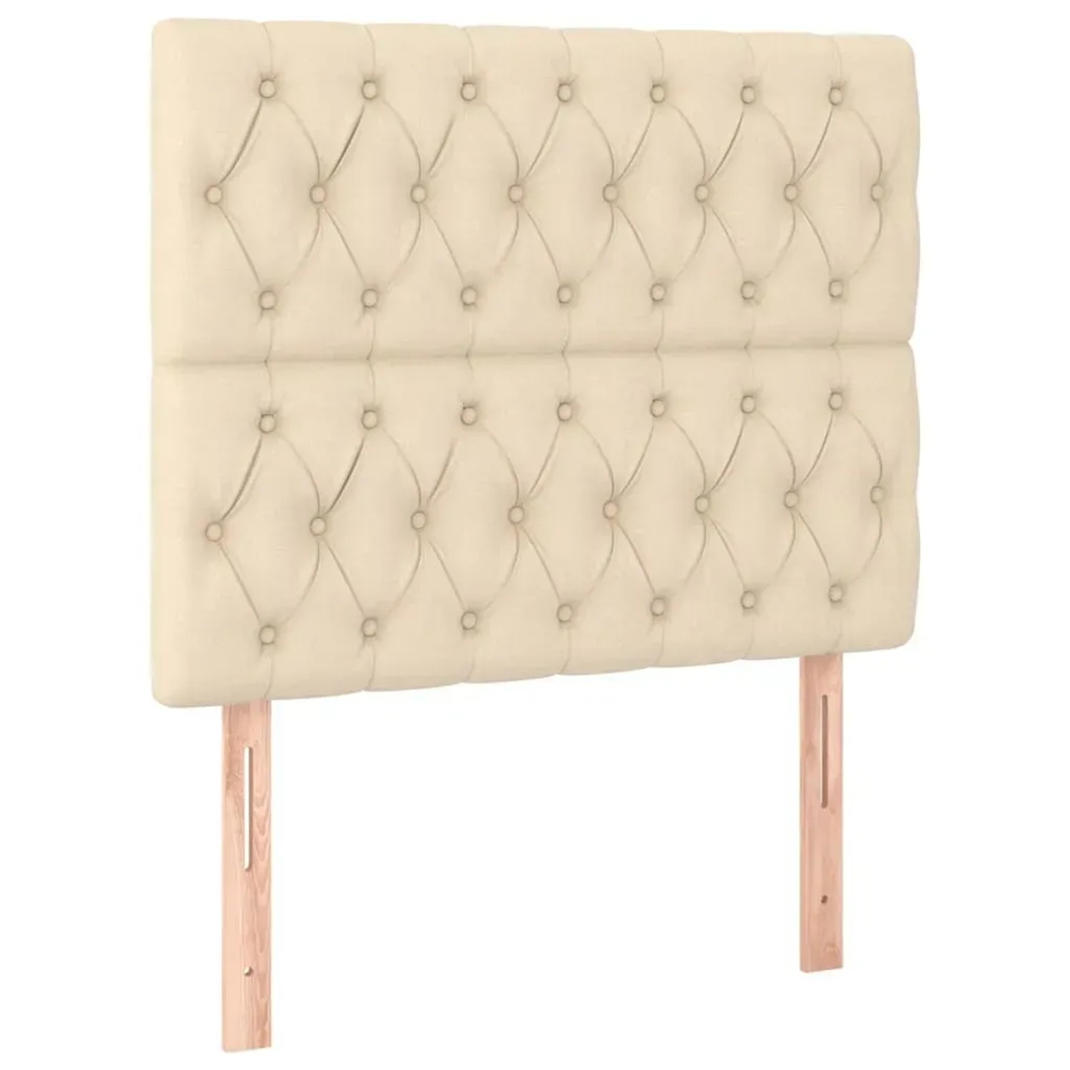 Cremefarbenes Boxspringbett-Kopfteil mit Knopfheftung und Holzfüßen.