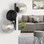 Moderne Globo LED-Wandleuchte Riha, 2-flammig, schwarz matt mit rauchfarbenen Glaskugeln.