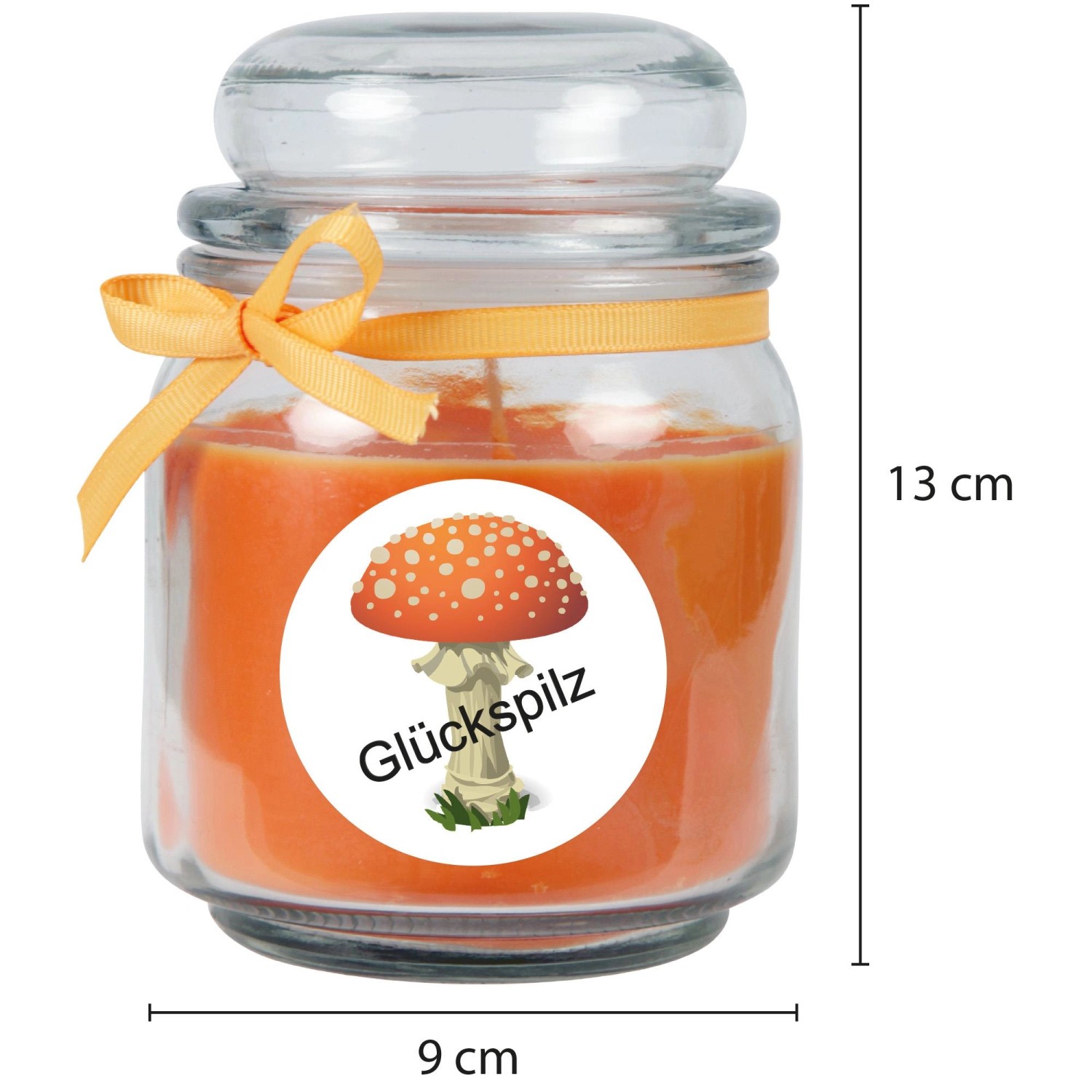 Orange Duftkerze im Glas mit Glückspilz-Motiv und Schleife. Dekorative Kerze für entspannte Atmosphäre.