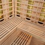 Innenansicht Artsauna Infrarotkabine Kiruna150 aus Hemlockholz mit Sitzbank und Infrarotstrahler.