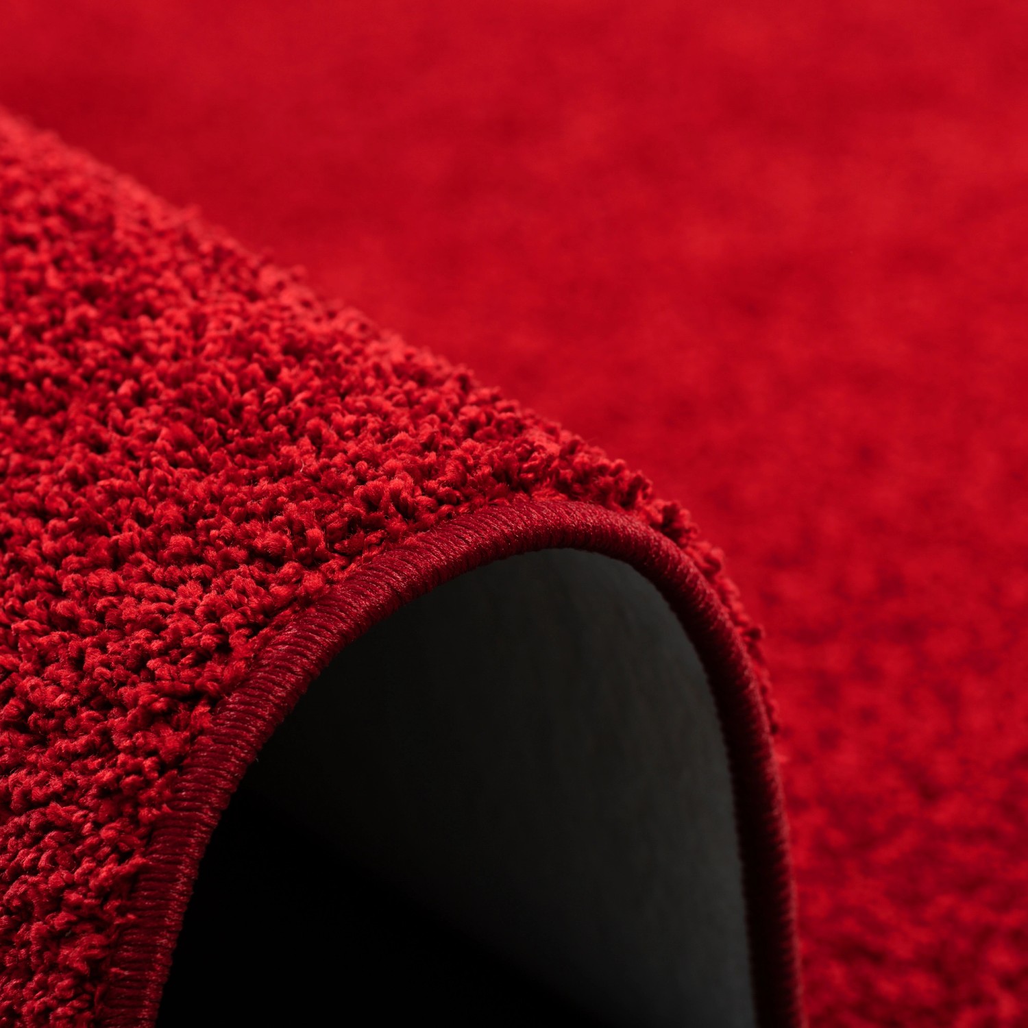 Detailansicht: Roter Snapstyle Hochflor Teppich Cottage, 160x160cm. Weicher Langflor Teppich.